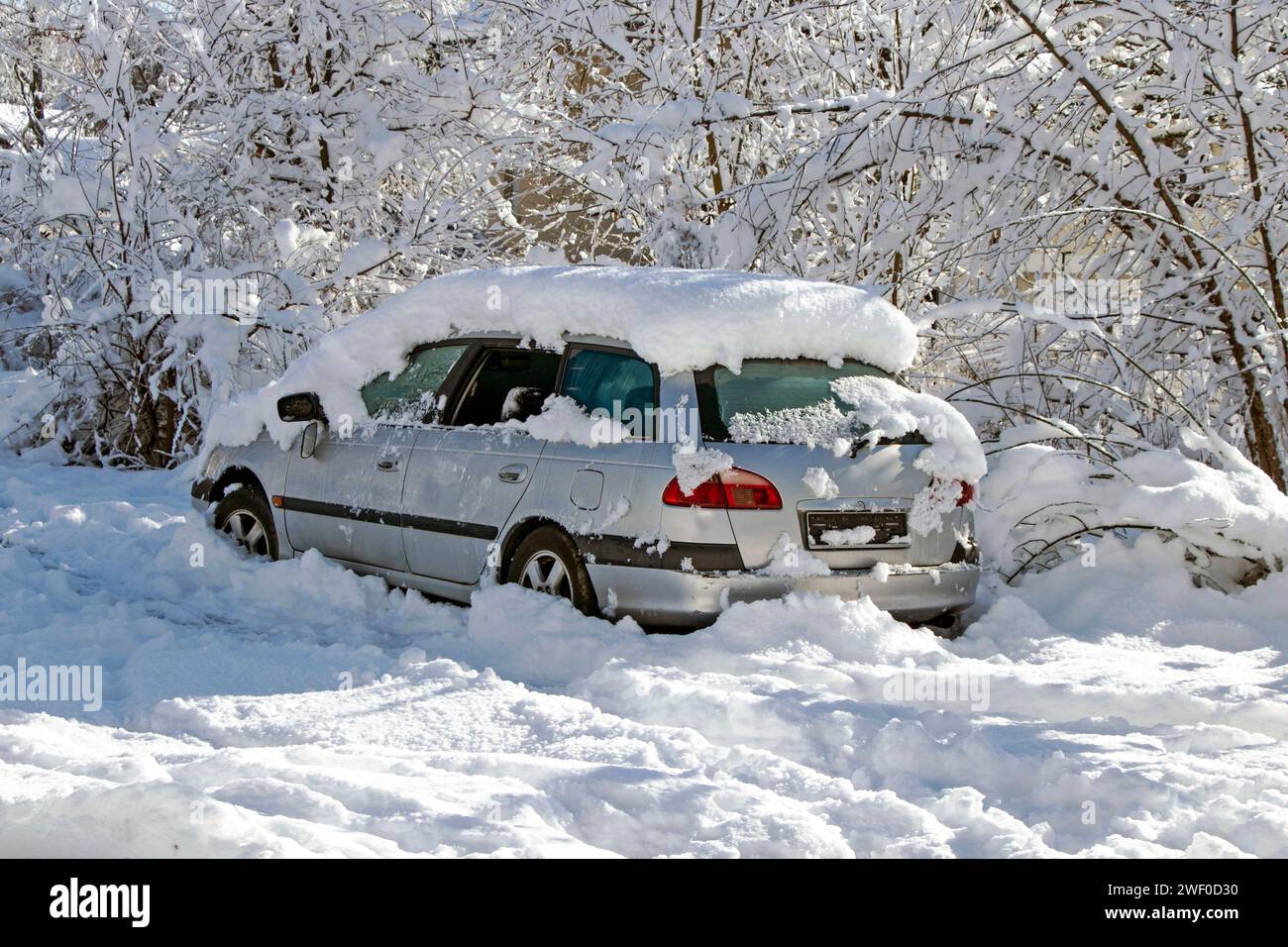 Car covered with snow Stock Photo