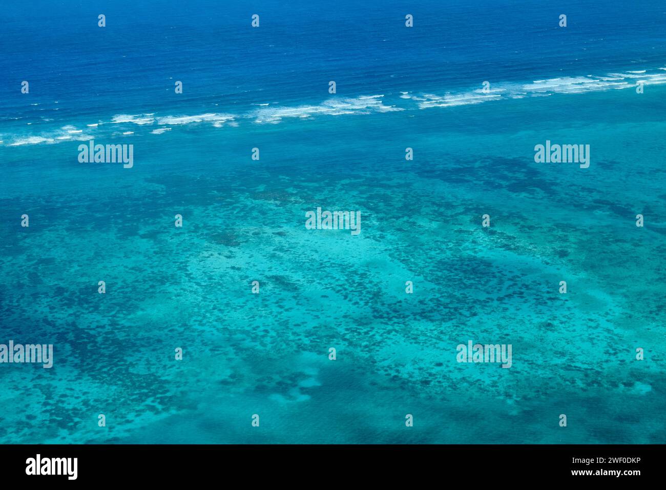 An aerial view of the Belize Barrier Reef, which is part of the ...