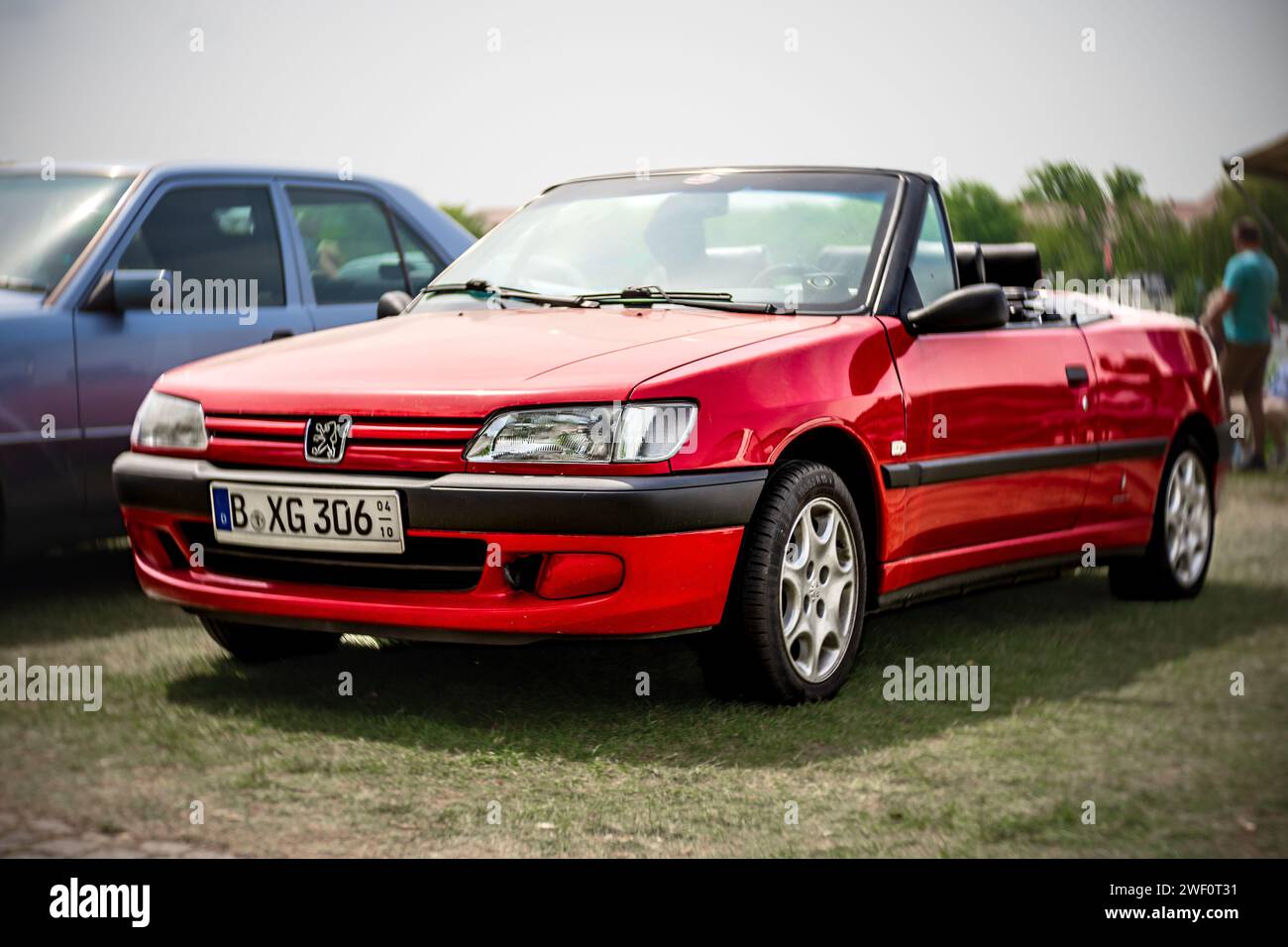 WERDER (HAVEL), GERMANY - MAY 20, 2023: The small family car Peugeot 306 Cabriolet. Swirl bokeh. Art lens. Oldtimer - Festival Werder Classics 2023 Stock Photo