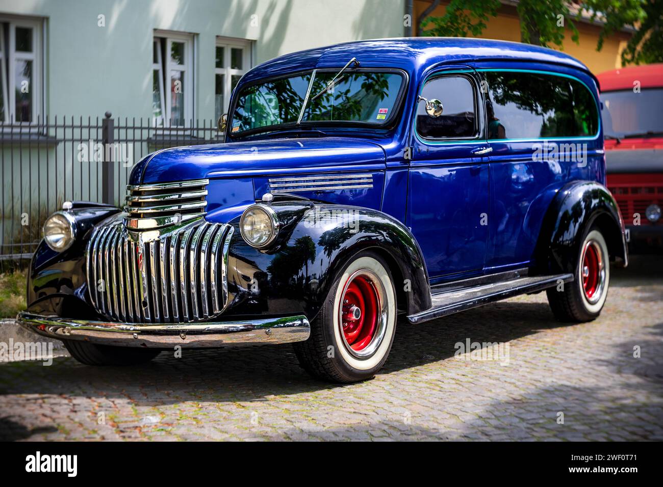 WERDER (HAVEL), GERMANY - MAY 20, 2023: The full-size station wagon Chevrolet Carryall Suburban, 1941. Swirl bokeh. Art lens. Stock Photo