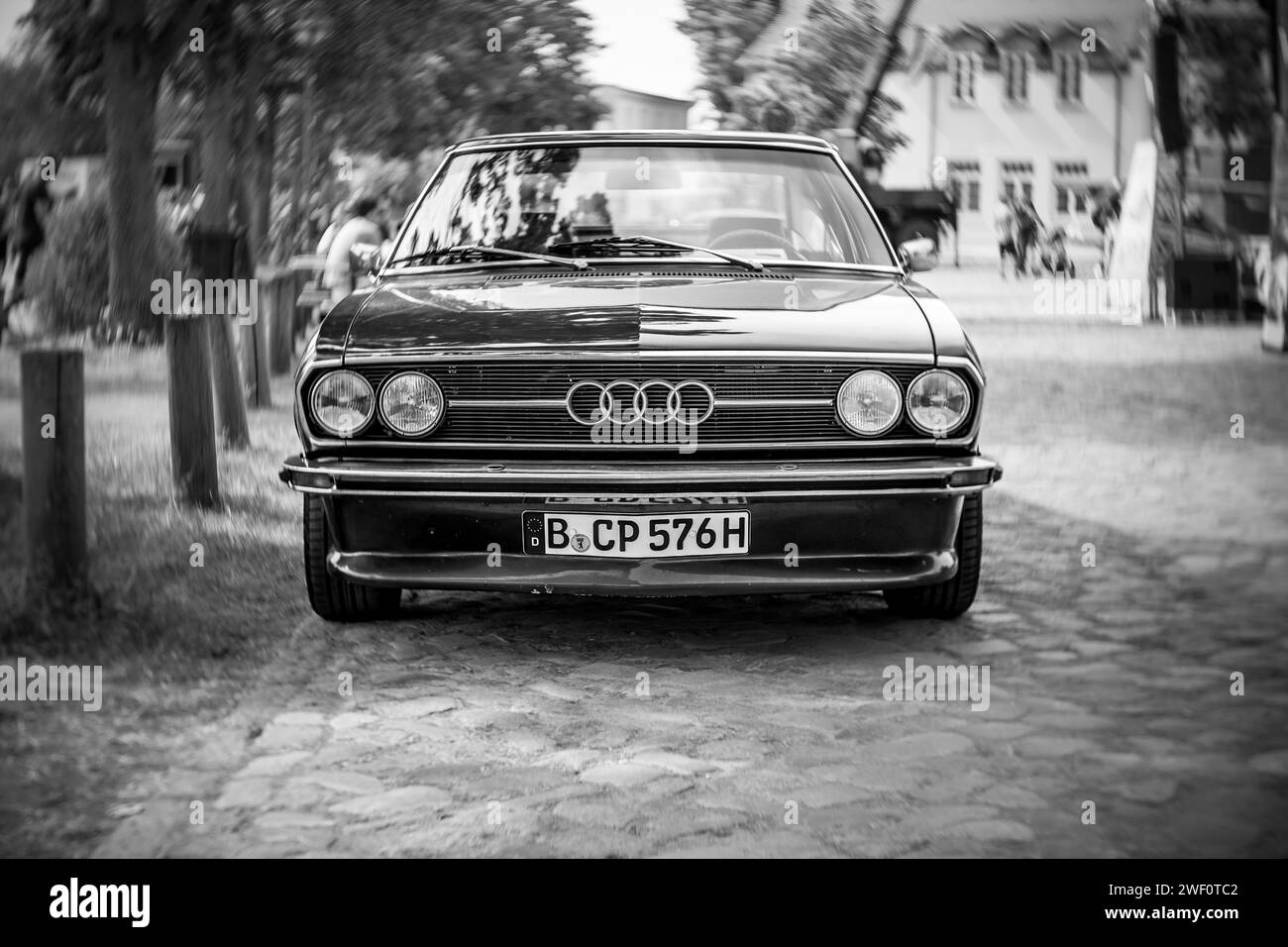 WERDER (HAVEL), GERMANY - MAY 20, 2023: The mid-size car Audi 100 Coupe S, 1976. Swirl bokeh, art lens.  Festival Werder Classics 2023 Stock Photo
