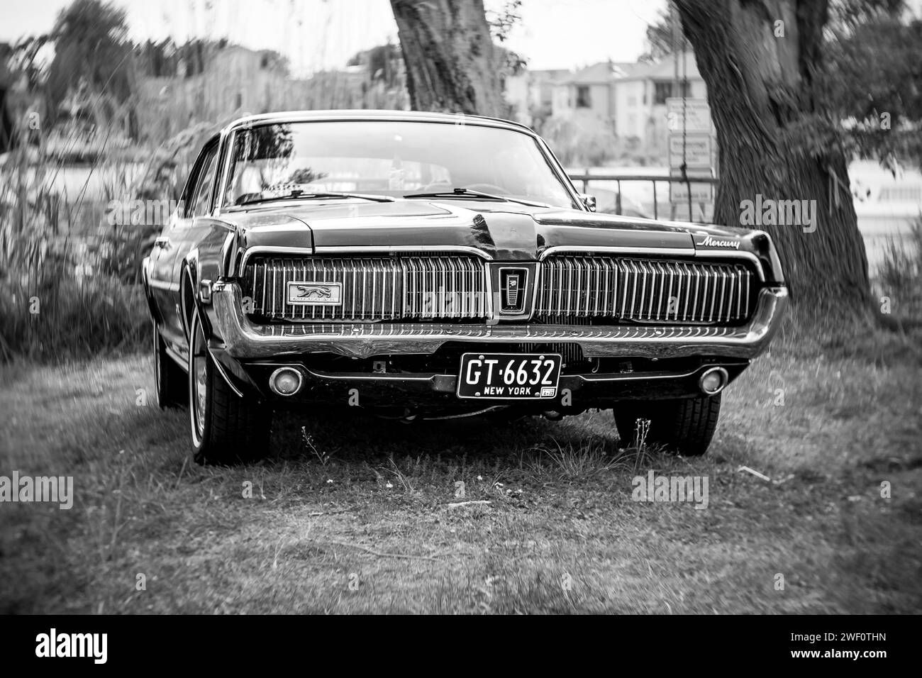 WERDER (HAVEL), GERMANY - MAY 20, 2023: The pony car Mercury Cougar GT. Swirl bokeh. Art lens. Black and white. Festival Werder Classics 2023 Stock Photo