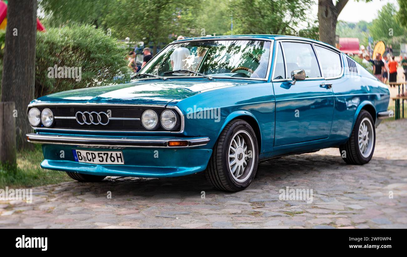 WERDER (HAVEL), GERMANY - MAY 20, 2023: The mid-size car Audi 100 Coupe S, 1976. Swirl bokeh, art lens. Oldtimer - Festival Werder Classics 2023 Stock Photo