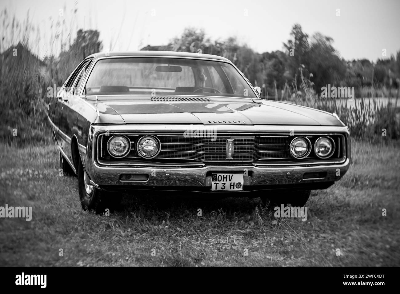 WERDER (HAVEL), GERMANY - MAY 20, 2023: The full-size car Chrysler New Yorker. Swirl bokeh. Art lens. Oldtimer - Festival Werder Classics 2023 Stock Photo