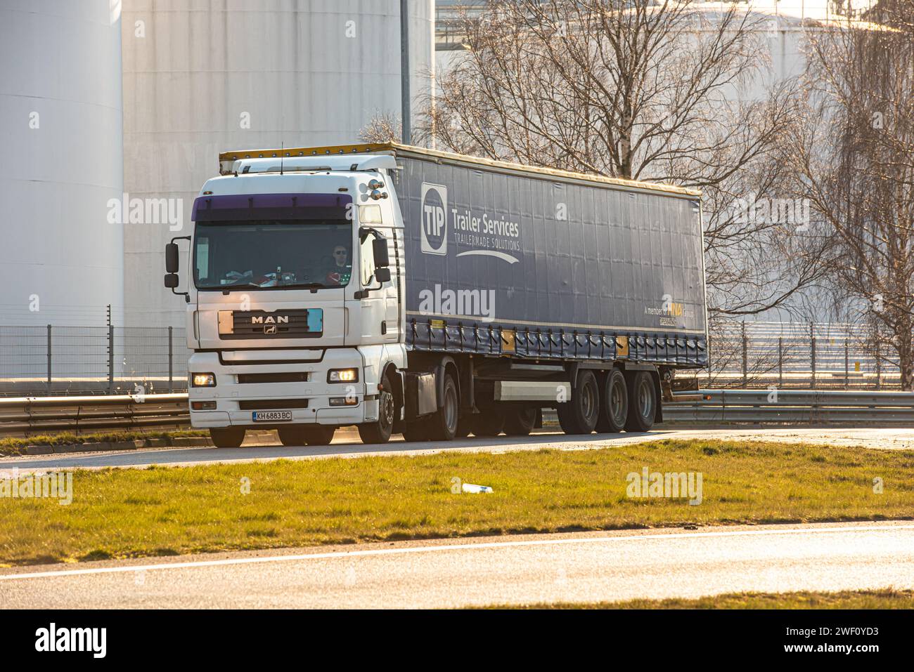 Gothenburg, Sweden - March 26 2020: White MAN TGA truck with a TIP trailer. Stock Photo