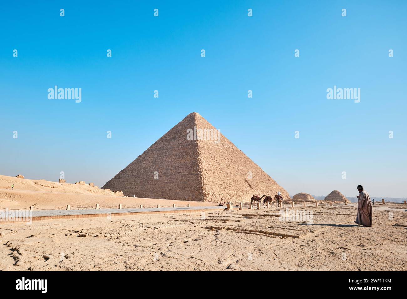 Giza, Egypt - December 24 2023: The Great Pyramid Khufu (Pyramid of Cheops) is the oldest and largest of the three pyramids in the Giza Stock Photo