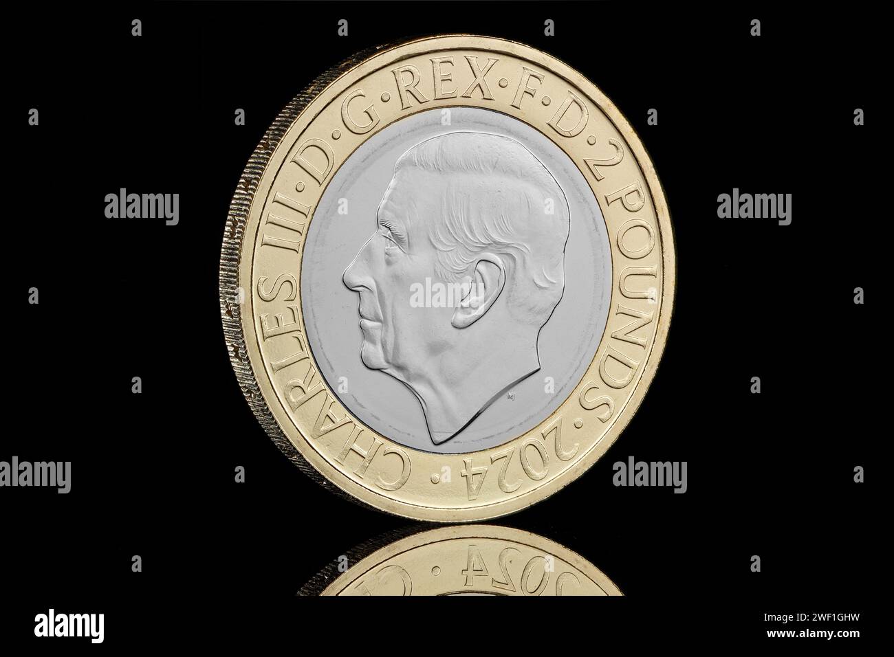 2024 £2 coin featuring the first portrait of King Charles III and was designed by Martin Jennings. Stock Photo