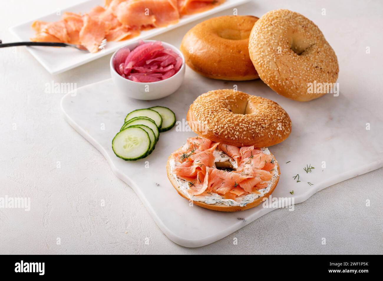 Bagels served with cream cheese, smoked salmon and fresh cucumber