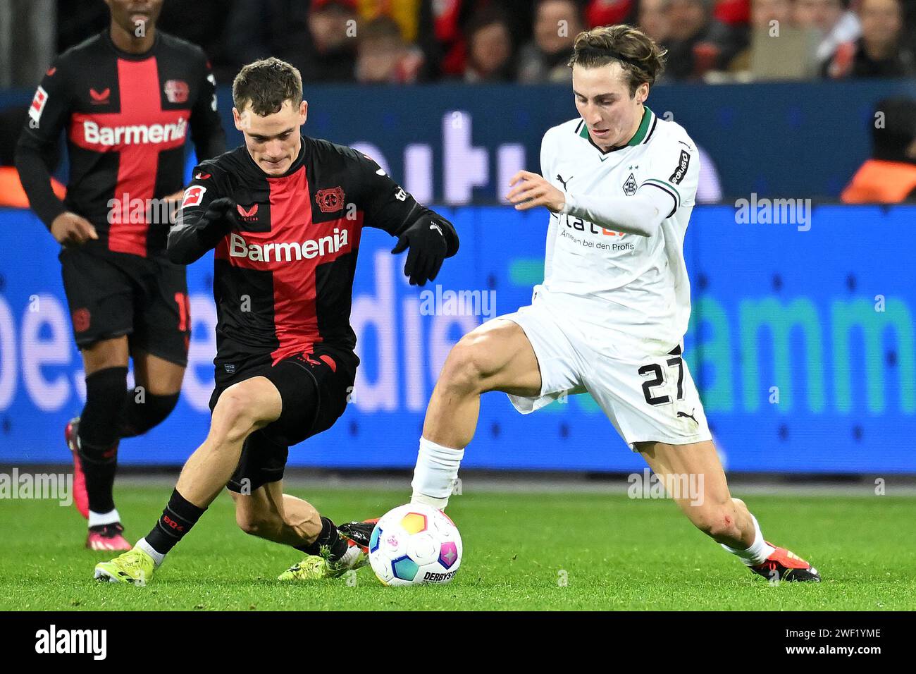 Leverkusen, Germany. 27th Jan, 2024. Florian Wirtz (L) Of Bayer 04 ...