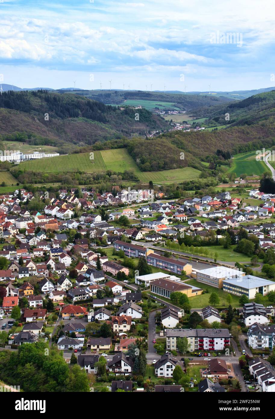 Bad Munster, Germany - May 9, 2021: Houses and buildings in a German town below Rotenfels on a spring day in Rhineland Palatinate, Germany. Stock Photo