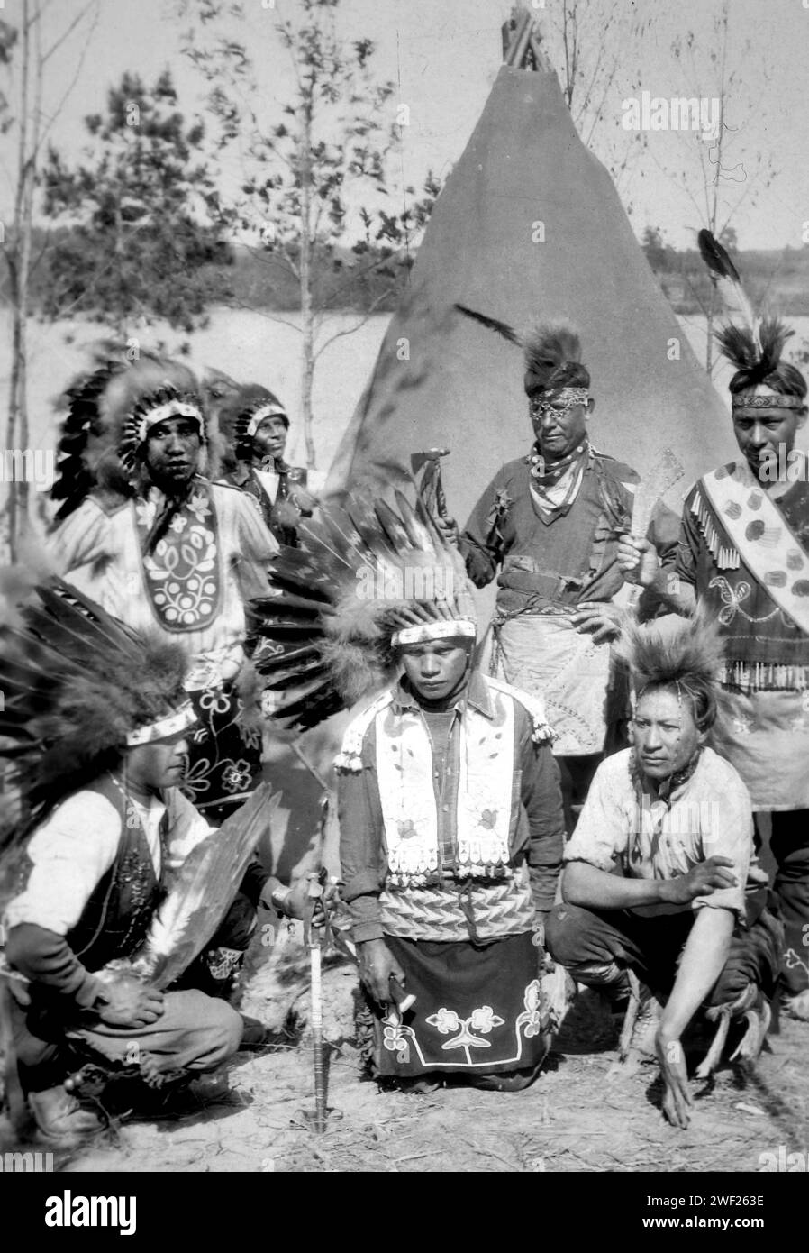 Native American men in traditional costume in Wisconsin, ca. 1910. Stock Photo