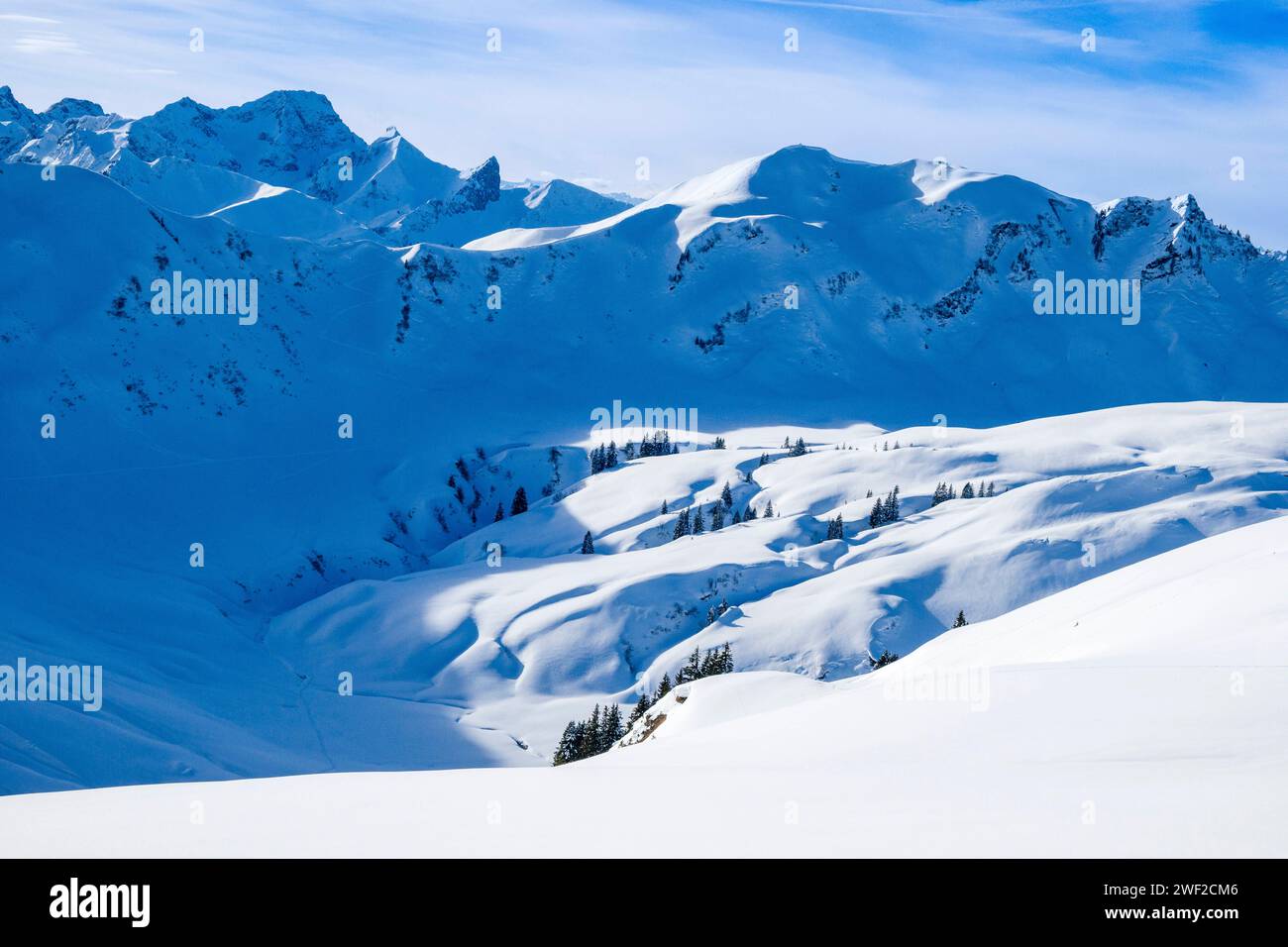 The mountain Riedberger Horn in a winter landscape in Kleinwalsertal valley, seen from the ascent to the mountain Hählekopf. Mittelberg Vorarlberg Aus Stock Photo