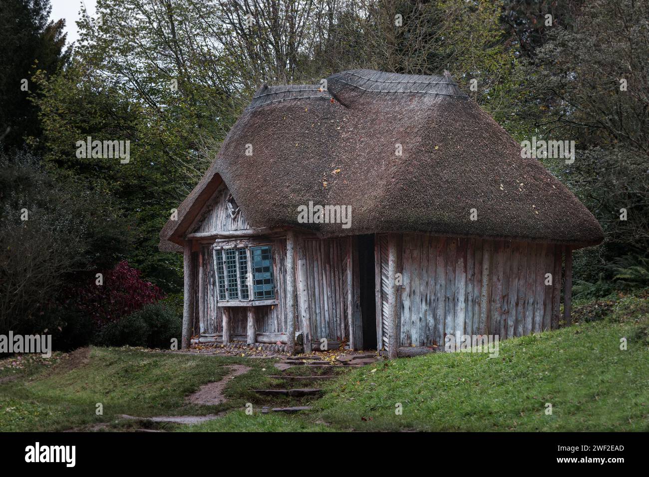 old thatched building at Killerton Gardens, Exeter, UK Stock Photo