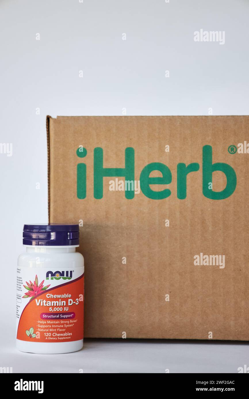 Jar of vitamin D3 NOW Foods Company, near iHerb Brown Cardboard box ...