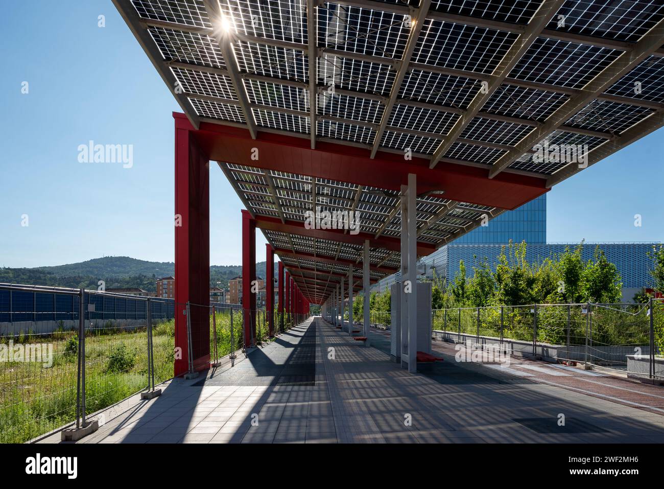 Turin, Piedmont, Italy. Pedestrian street shelter architectures with cycle lane on the outskirts of the city Stock Photo