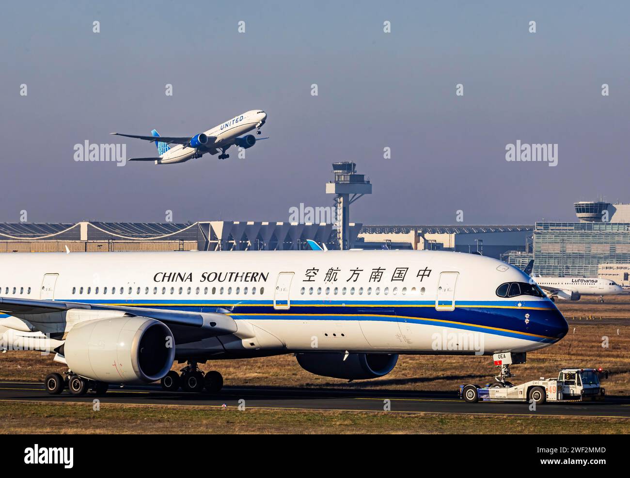 United Airlines aircraft taking off at Frankfurt Airport, Fraport Airport with tower. B-30EA, CHINA SOUTHERN AIRLINES, AIRBUS A350-941, Frankfurt am Stock Photo