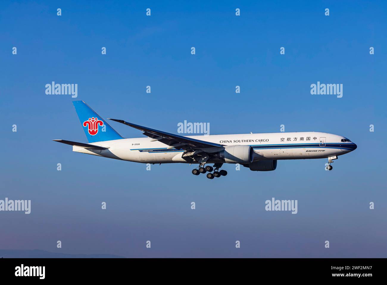 Aircraft approaching Frankfurt Airport, Fraport Airport. B-2028, CHINA SOUTHERN AIRLINES, BOEING 777-F1B, Frankfurt am Main, Hesse, Germany Stock Photo