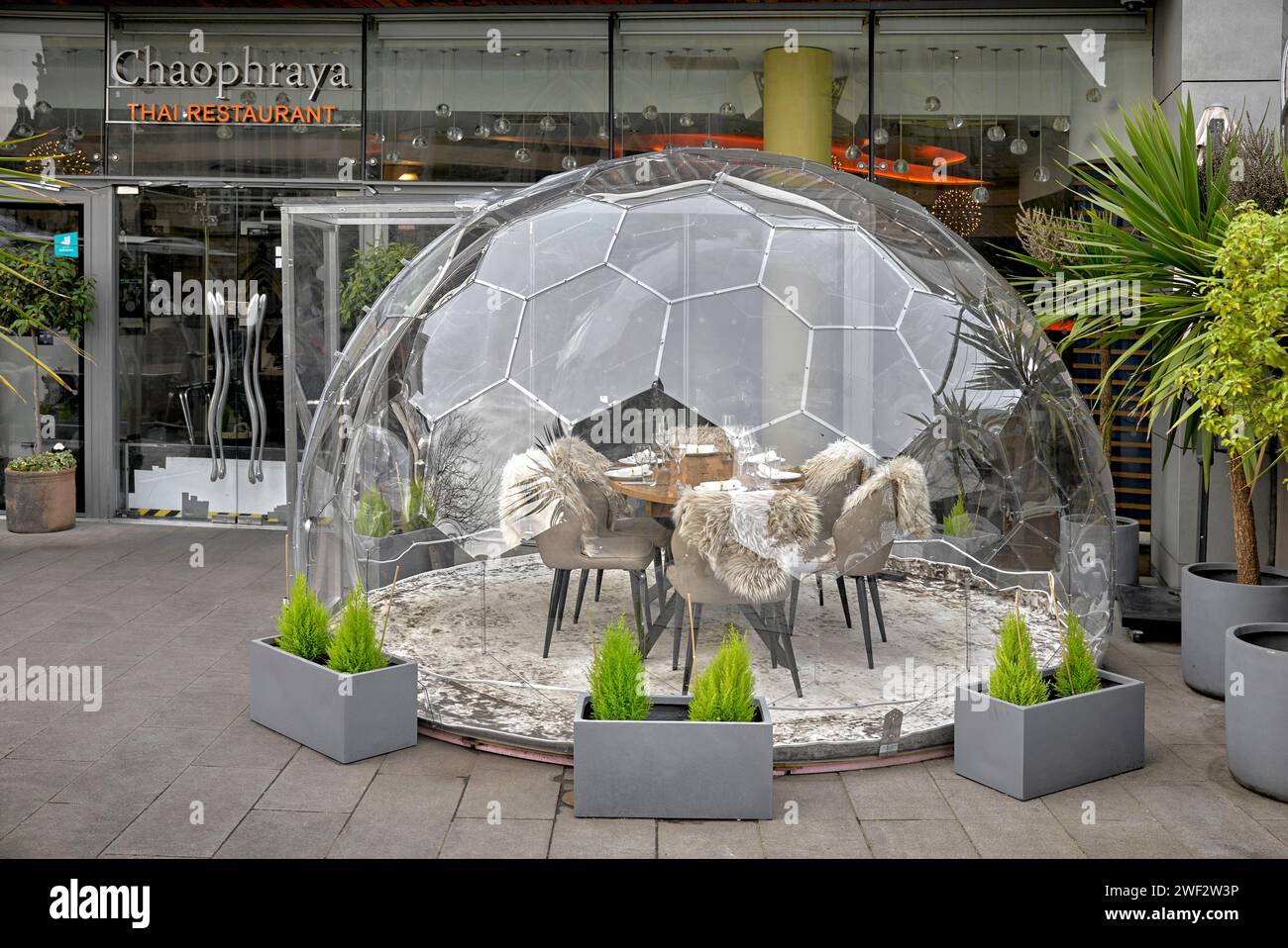 Dining dome for warm outdoor dining at the Chaophraya Thai restaurant Birmingham England UK Stock Photo