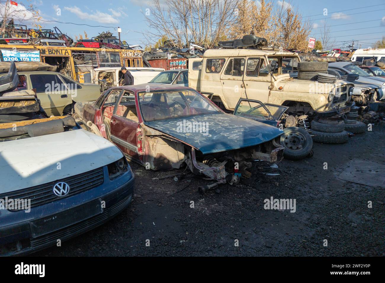 car parts at open air junkyard and used spare parts market in
