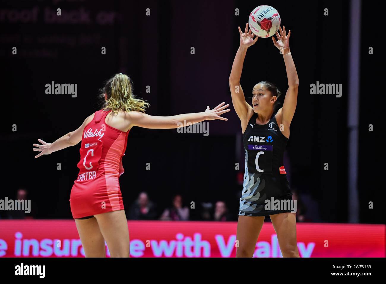 Leeds, UK. 27th Jan, 2024. Picture by Olly Hassell/SWpix.com - 27/01/2024 - Netball - Vitality Netball Nations Cup 2024 - Vitality Roses v New Zealand Silver Ferns - the First Direct Arena, Leeds, England - New Zealand's Whitney Souness and England's Amy Carter Credit: SWpix/Alamy Live News Stock Photo