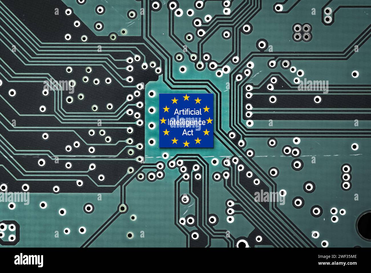 Flag of European Union on a microprocessor, CPU or GPU microchip on a motherboard. AI Act Stock Photo