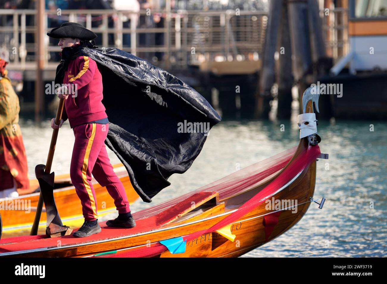 A man takes part in the traditional rowing parade, part of the Venice