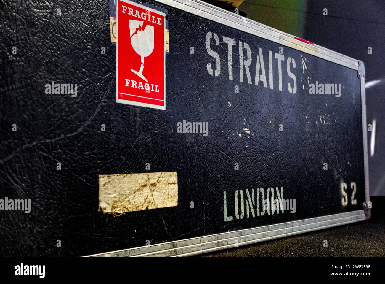 Well travelled flight cases belonging to Dire Strait's frontman Mark Knopfler, being sold for charity at auction along with 120 guitars. Stock Photo