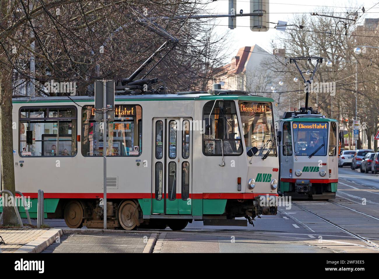 Magdeburg, Germany. 28th Jan, 2024. A Tatra streetcar travels through the state capital before being retired from regular service after 34 years. The angular streetcar cars from the Czech Republic were used for the first time in May 1990. Magdeburg's public transport company will decommission the last two remaining trains by the end of March 2024. Credit: Peter Gercke/dpa-Zentralbild/dpa/Alamy Live News Stock Photo