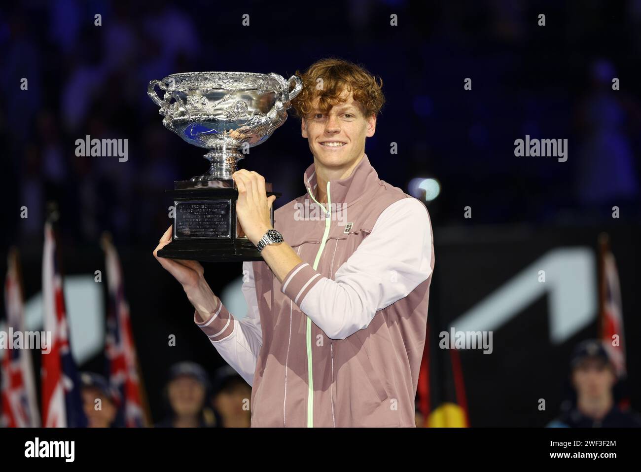 Melbourne, Australia. 28th Jan, 2024. 4th seed JANNIK SINNER of Italy poses with the Norman Brookes Challenge Cup after winning the Men's Singles Final match against Danil Medvedev of the Russian Federation on Rod Laver Arena on day 15 of the 2024 Australian Open in Melbourne, Australia. Sydney Low/Cal Sport Media/Alamy Live News Stock Photo