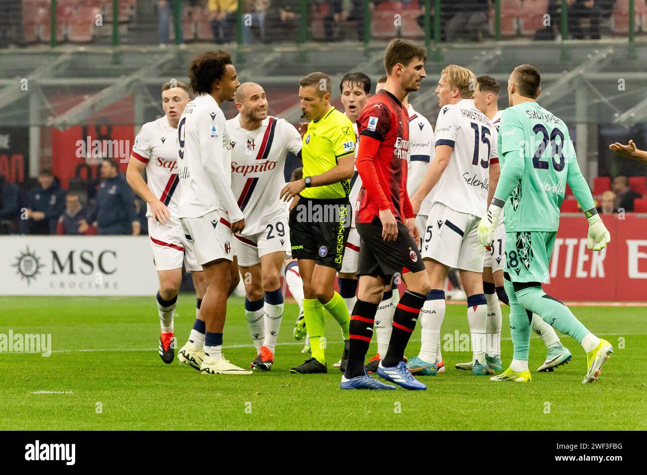 Referee Davide Massa and Lorenzo De Silvestri 29 in action during the