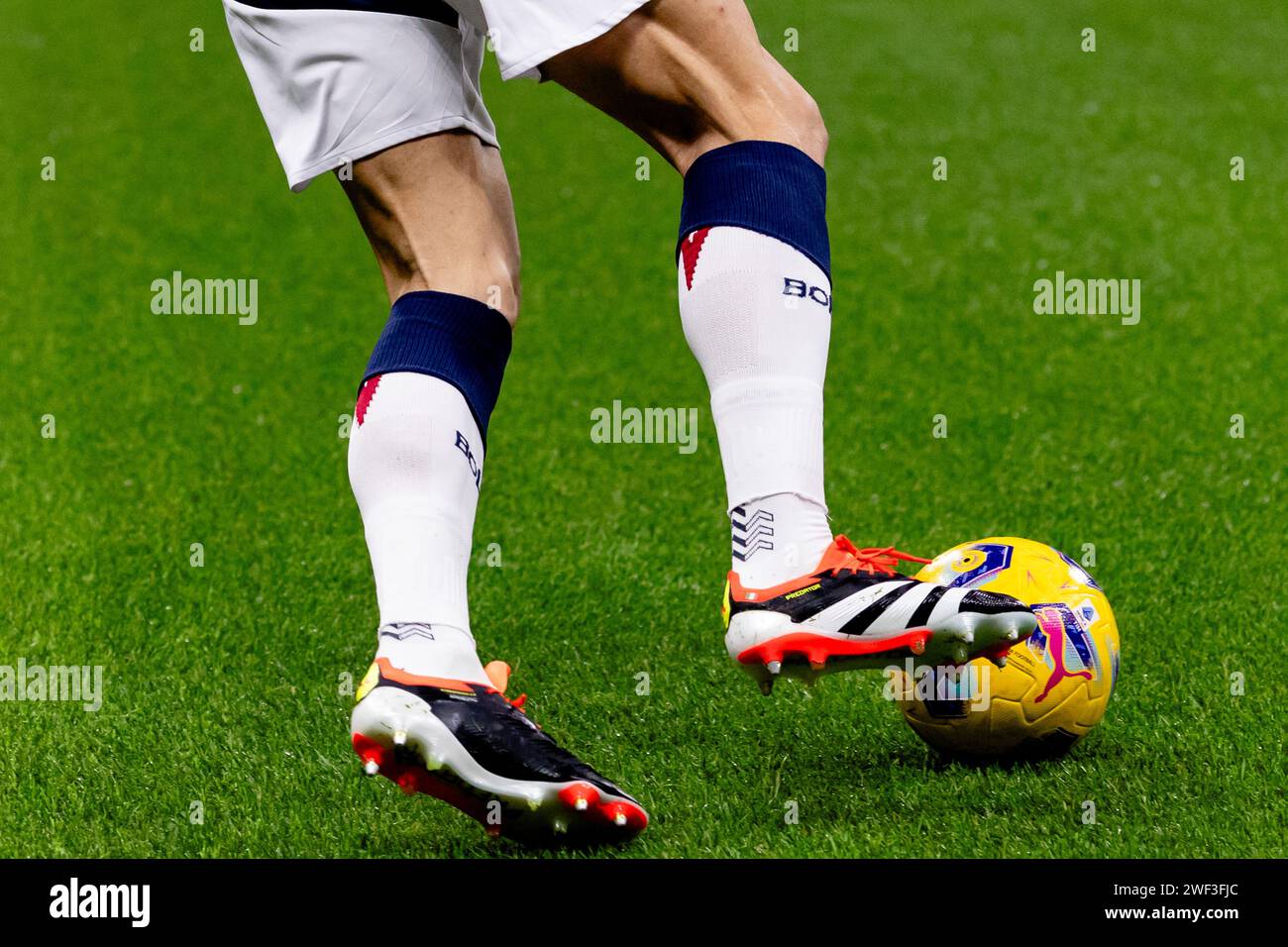 Lorenzo De Silvestri of Bologna FC wearing the new Adidas Predator shoes during the Serie A football match between AC Milan and Bologna FC 1909 at Giuseppe Meazza stadium in Milano, Italy, on January 027 2024 Stock Photo