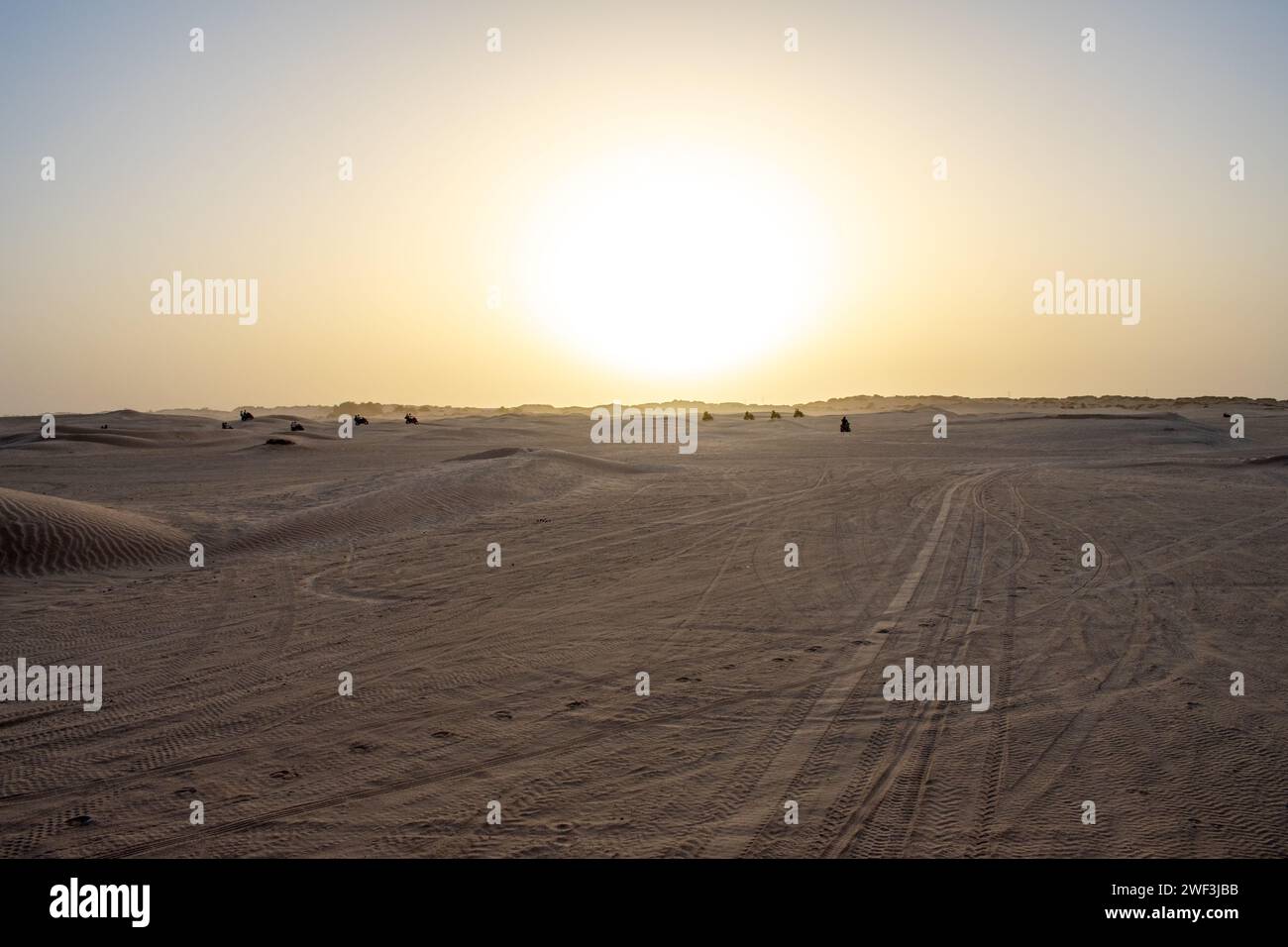 Beautiful sunset over Sahara desert in Douz, Tunisia. Sand and dunes against sky Stock Photo