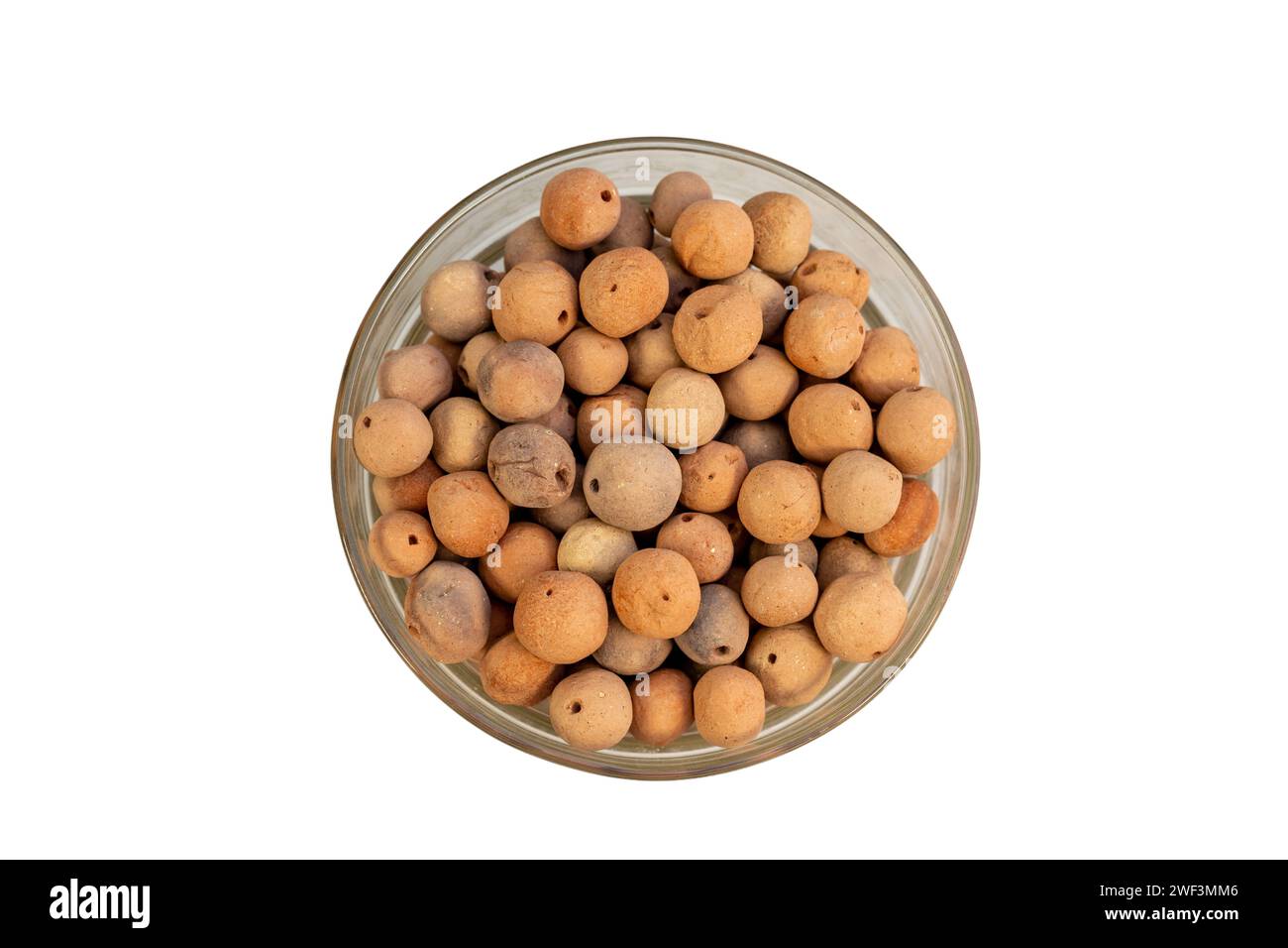 Clay Balls for plants in glass pot on white isolated background Stock Photo