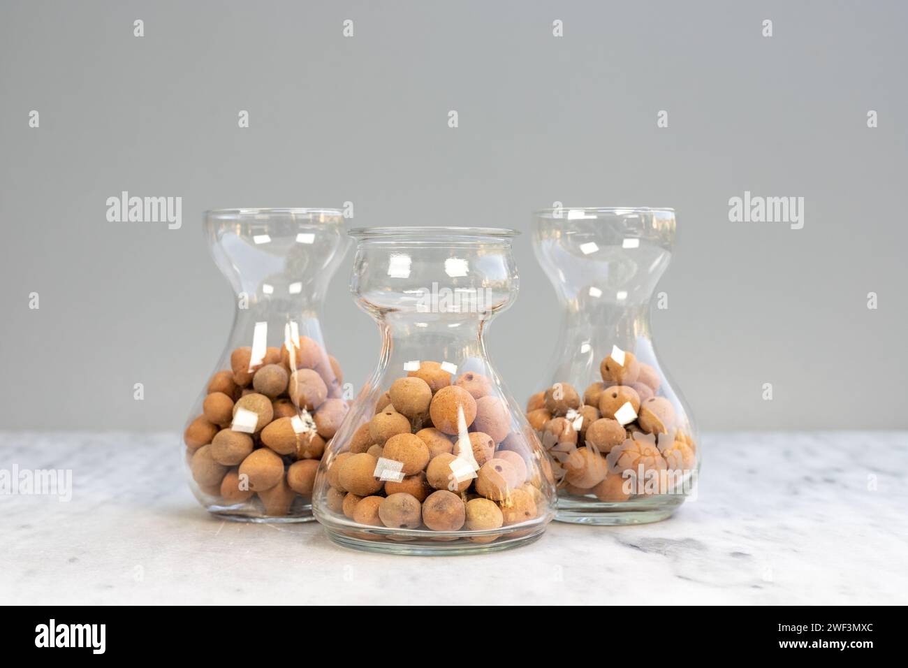 Leca clay balls in a crystal clear vases Stock Photo Alamy
