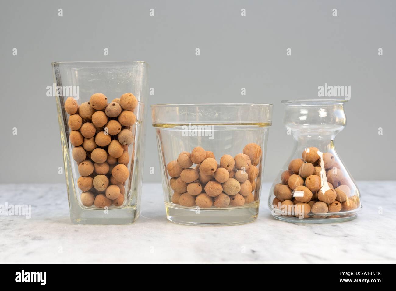 Light weight expanded aggregate balls in glass transparent vase and ...