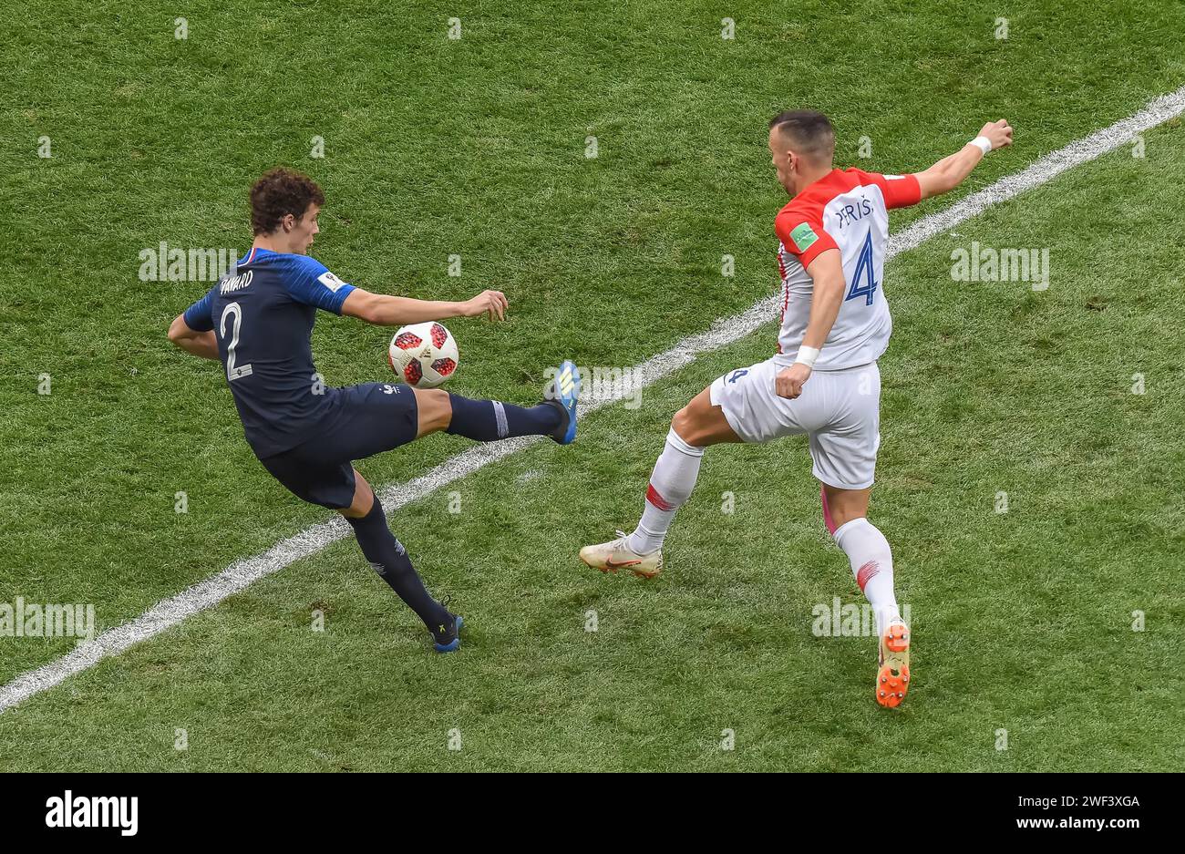 Moscow, Russia – July 15, 2018. France national football team defender Benjamin Pavard and Croatia midfielder Ivan Perisic during World Cup 2018 final Stock Photo