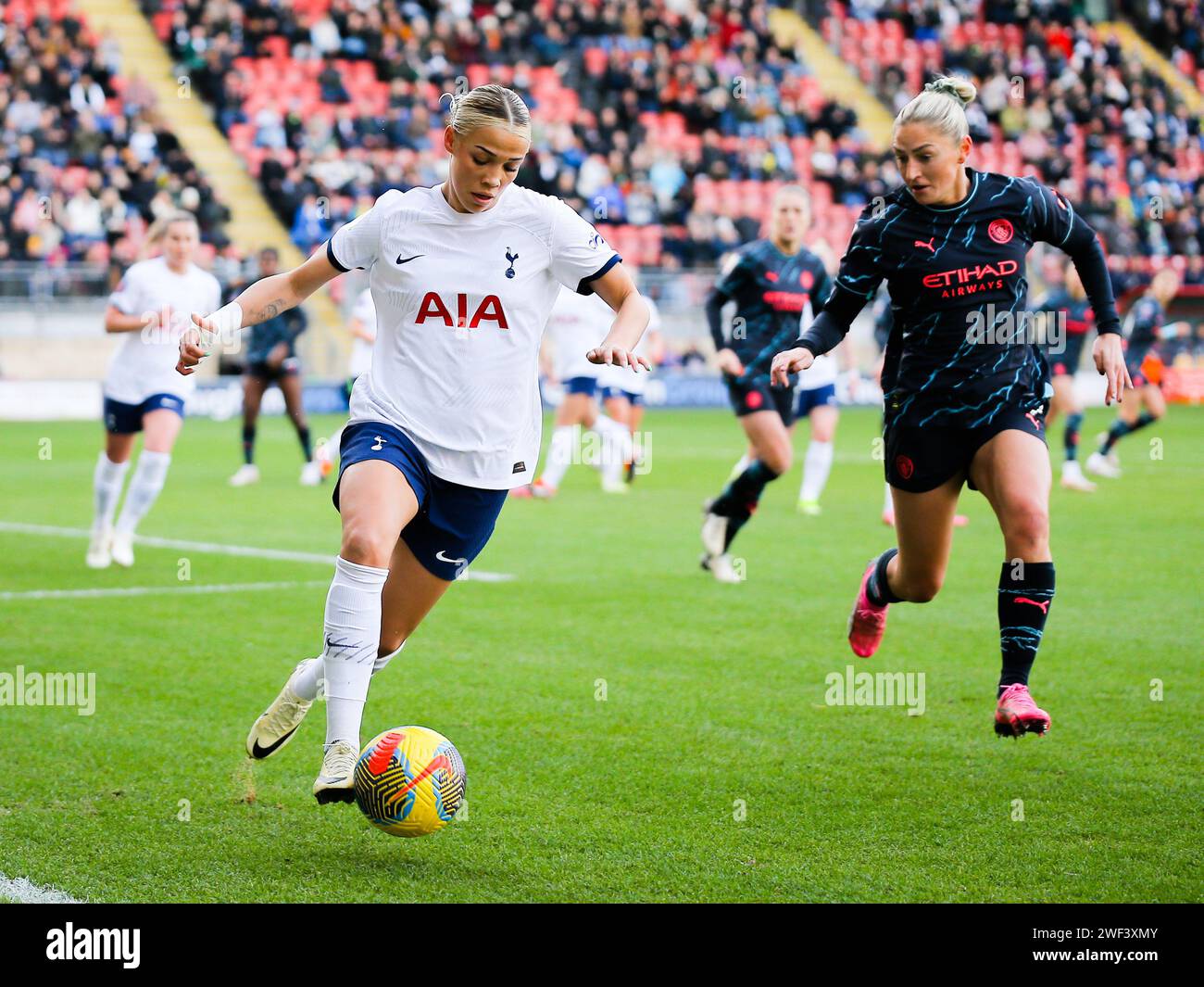 London, UK. 28th Jan, 2024. London, England, January 28 2024: Celin Bizet Ildhusoy (14 Tottenham Hotspur) and Laura Coombs (7 Manchester City) battle for the ball during the Barclays FA Womens Super League game between Tottenham Hotspur and Manchester City at Brisbane Road in London, England. (Jay Patel/SPP) Credit: SPP Sport Press Photo. /Alamy Live News Stock Photo