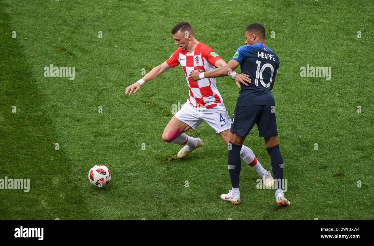 Moscow, Russia – July 15, 2018. Croatia national football team midfielder Ivan Perisic with France striker Kylian Mbappe during World Cup 2018 final m Stock Photo