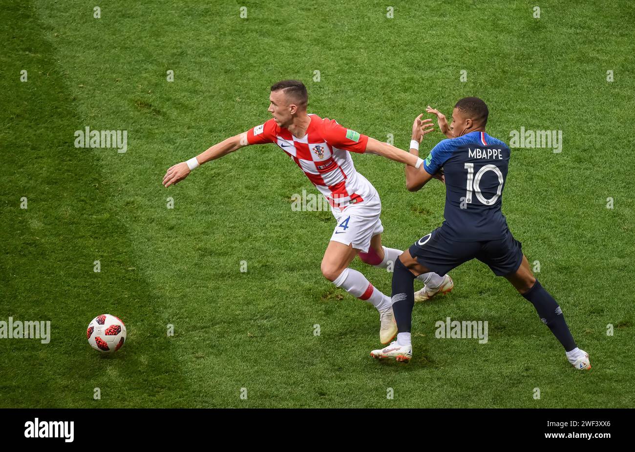 Moscow, Russia – July 15, 2018. Croatia national football team midfielder Ivan Perisic with France striker Kylian Mbappe during World Cup 2018 final m Stock Photo