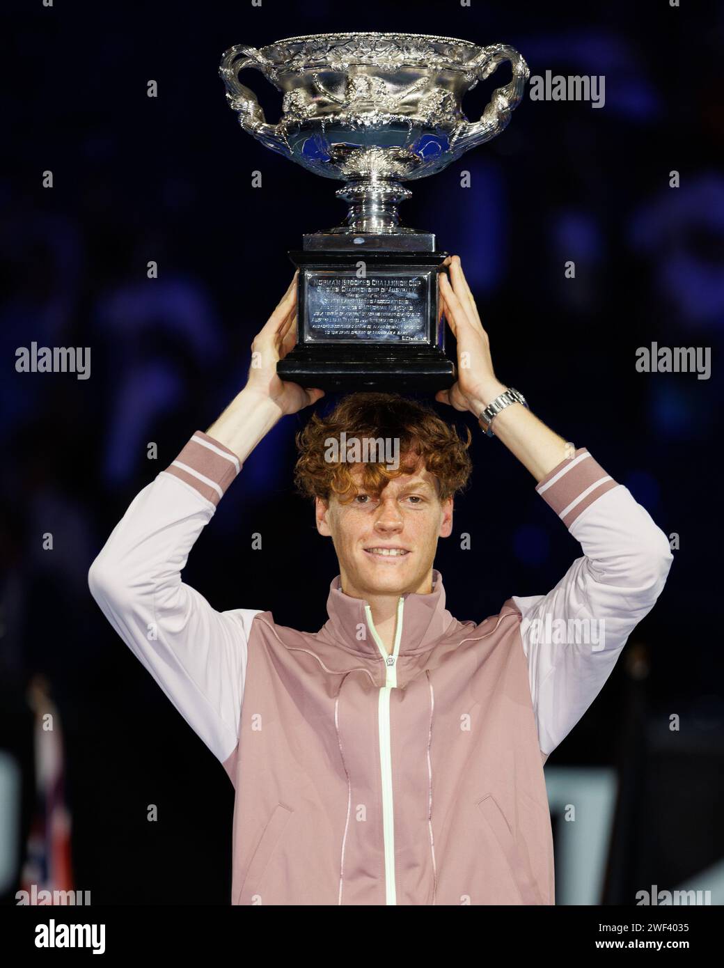 Melbourne, Australia. 28th Jan, 2024. 4th seed JANNIK SINNER of Italy poses with the Norman Brookes Challenge Cup after winning the Men's Singles Final match against Danil Medvedev of the Russian Federation on Rod Laver Arena on day 15 of the 2024 Australian Open in Melbourne, Australia. Sydney Low/Cal Sport Media/Alamy Live News Stock Photo