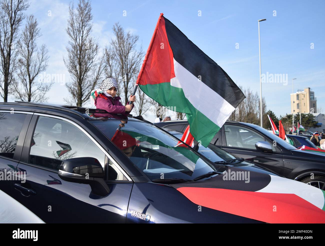 Rotterdam, Netherlands. 27th Jan, 2024. Pro-Palestinian gather for a car caravan demonstration to show solidarity with Palestinians and protest against Israeli attacks on Gaza as the participants drive through Rotterdam, Netherlands on January 27, 2024. Protesters forming a convoy with vehicles with Palestinian flags and banners. (Photo by Mouneb Taim/INA Photo Agency/Sipa USA) Credit: Sipa USA/Alamy Live News Stock Photo