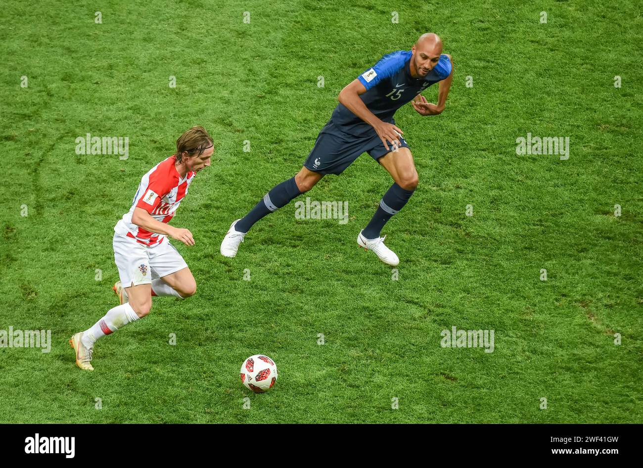 Moscow, Russia – July 15, 2018. Croatia national football team midfielder Luka Modric and France midfielder Steven Nzonzi during World Cup 2018 final Stock Photo