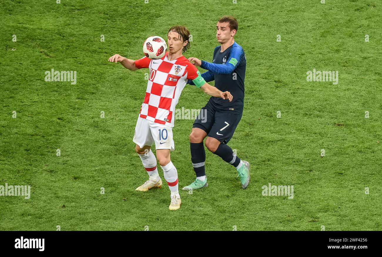 Moscow, Russia – July 15, 2018. Croatia national football team captain Luka Modric and France striker Antoine Griezmann during World Cup 2018 final ma Stock Photo