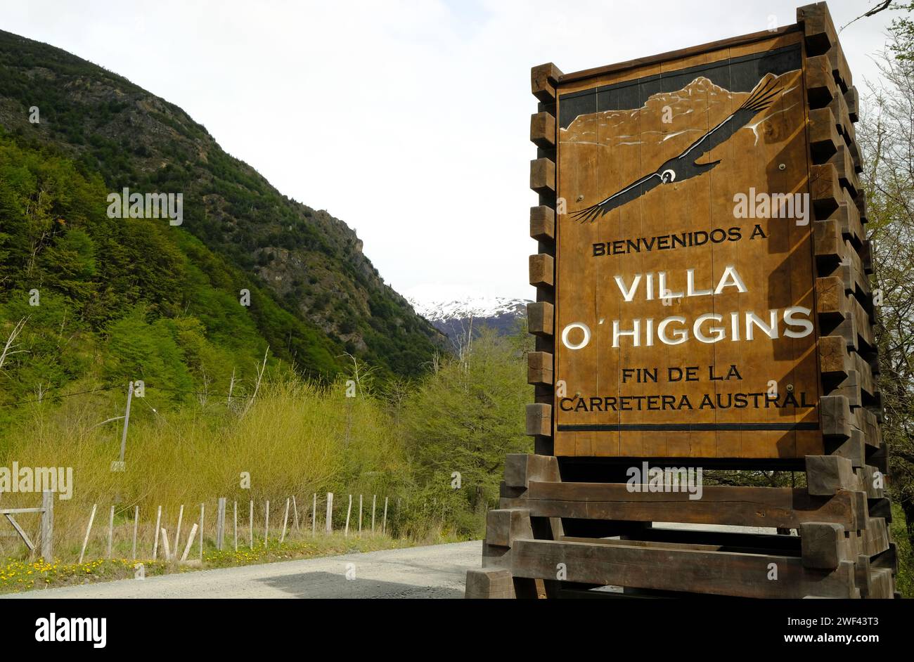 Road sign welcoming visitors into Villa O'Higgins at the end of the Carretera Austral in Chile. Stock Photo