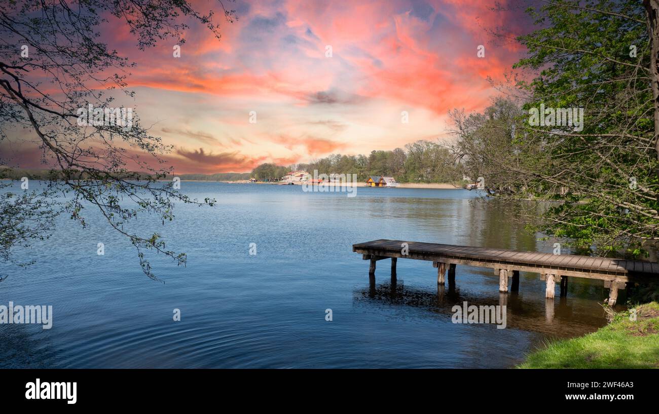 sunset over the lake on the Mecklenburg Lake District in Germany Stock Photo