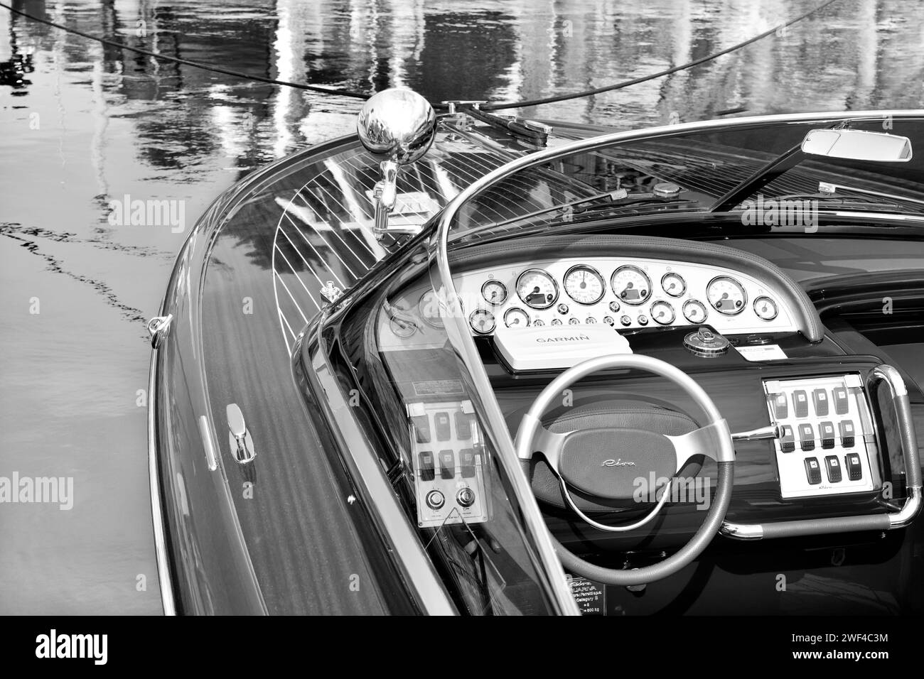 Aquariva motor board Riva - Ferretti Group Black and White Stock Photo