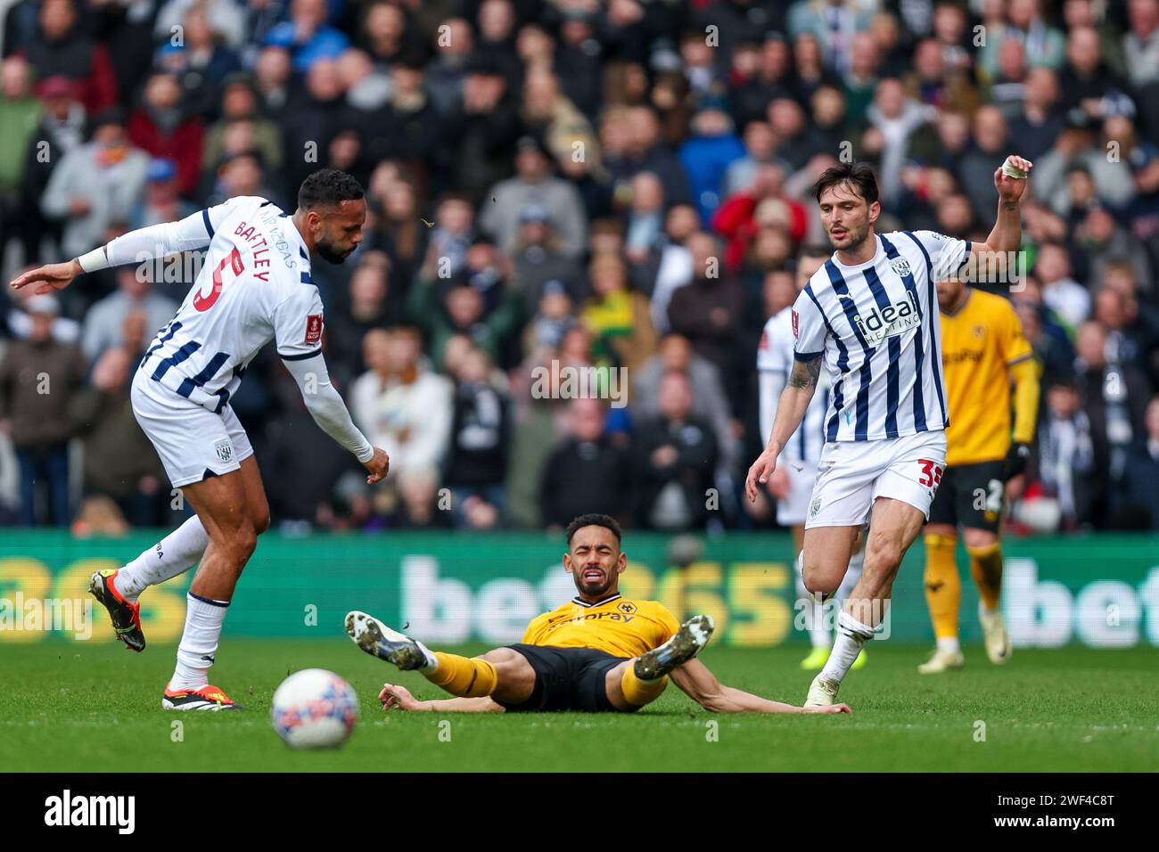 West Bromwich, UK. 28th Jan, 2024. Wolves' Matheus Cunha is brought down by the challenge by West Bromwich Albion's captain, Kyle Bartley as Okay Yokuślu races back during the Emirates FA Cup 4th Round match between West Bromwich Albion and Wolverhampton Wanderers at The Hawthorns, West Bromwich, England on 28 January 2024. Photo by Stuart Leggett. Editorial use only, license required for commercial use. No use in betting, games or a single club/league/player publications. Credit: UK Sports Pics Ltd/Alamy Live News Stock Photo