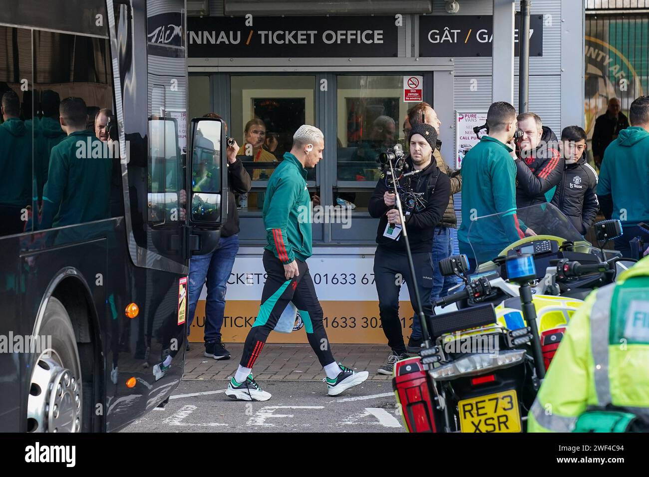 Newport, UK. 28th Jan, 2024. Manchester United forward Antony (21) arrives to waiting media teams during the Newport County AFC v Manchester United FC Emirates FA Cup 4th Round match at Rodney Parade, Newport, Wales, United Kingdom on 28 January 2024 Credit: Every Second Media/Alamy Live News Stock Photo