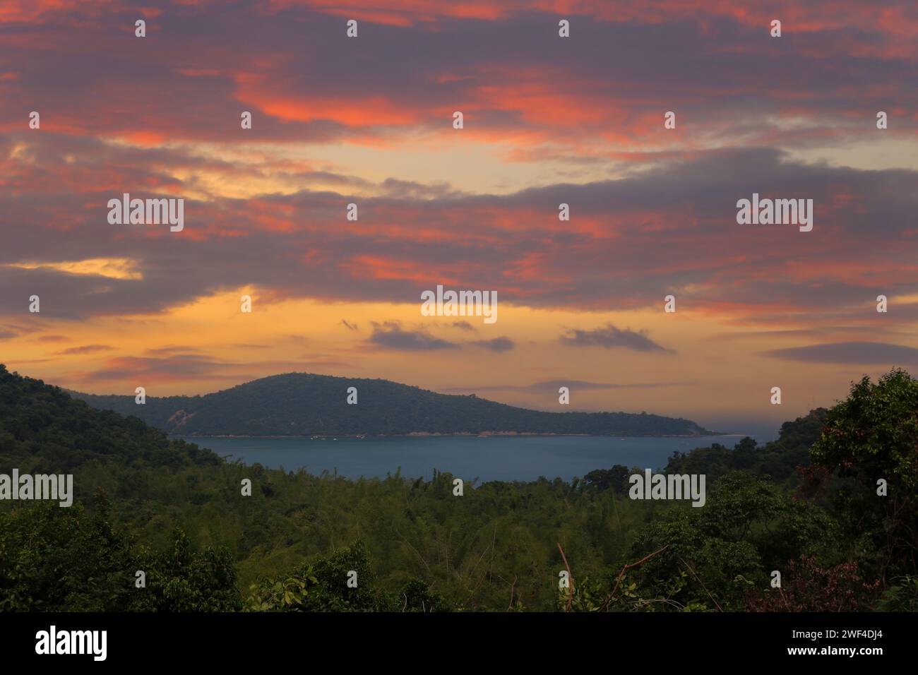 Beautiful view of an island in Thailand in the evening with a twilight sky as a backdrop. Stock Photo