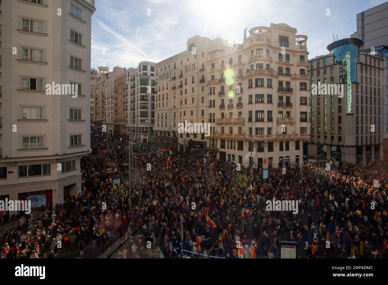 Madrid, Spain. 28th Jan, 2024. A crowd of demonstrators seen at the beginning of Gran Via street during a rally called by the Spanish Popular Party (PP). Thousands of people have filled the center of Madrid after being called by the Spanish Popular Party to a rally “against the amnesty and defend their country. The main event was held in Madrid's Plaza de España. (Photo by David Canales/SOPA Images/Sipa USA) Credit: Sipa USA/Alamy Live News Stock Photo